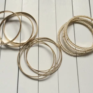  - Fina guldiga armband från hm