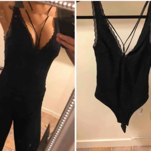  - Oanvänd body i storlek xs, lappar kvar 