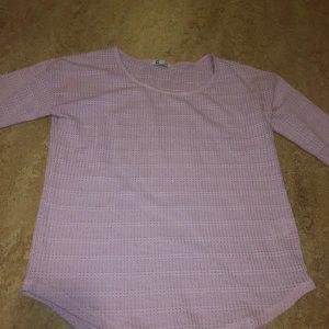 Babyrosa tröja - Babyrosa tröja i XS.