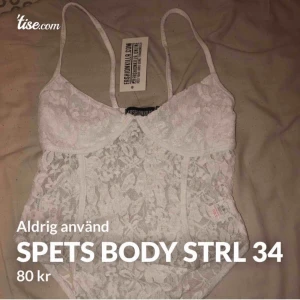  - En vit Spets bodysuit i storlek 34/XS. Aldrig använd, inte äns testad. Säljer pga fel storlek. 