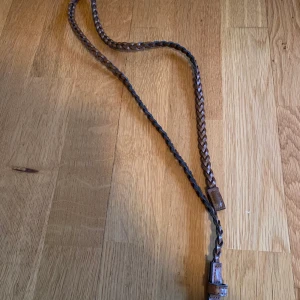 Flätat Bälte - Fint, flätat, bälte. Finns i Västerås annars står köparen för frakt.