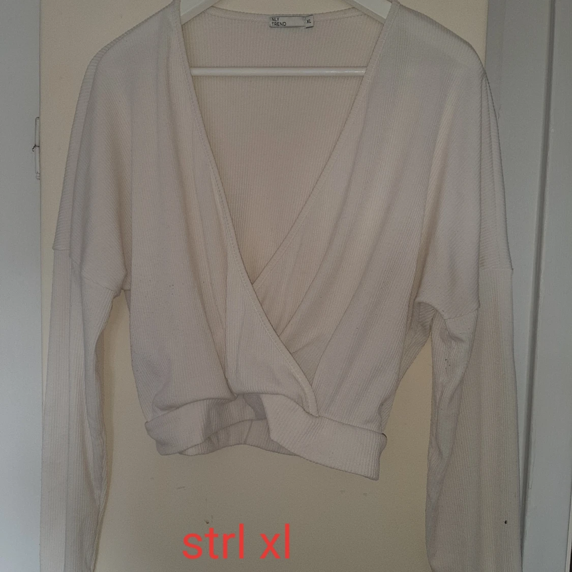 Långärmad croptopp