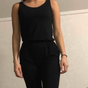  - Oanvänd jumpsuit