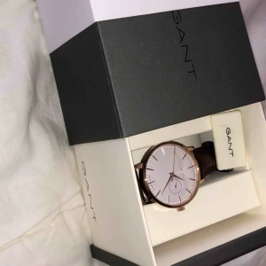  - En nästa helt ny gant klocka. Använd ett fåtal gånger 