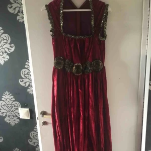  - Handmade dress for a mask party , looks very royal, nice material, fits very well for its loose fit.