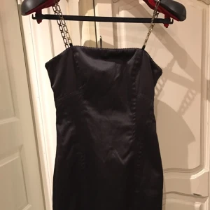 - Beautiful black mango dress with golden straps and leopard lining. Absolutely gorgeous. Used 2 times only 