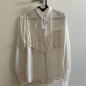 Blus med fransar - Blus med fransar. Aldrig använd.