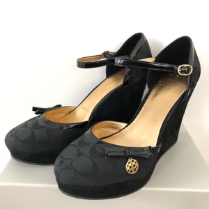 Coach high heels  - Black heels on a platform, very comfortable and classy looking