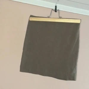 En kjol grön  - En grön kjol