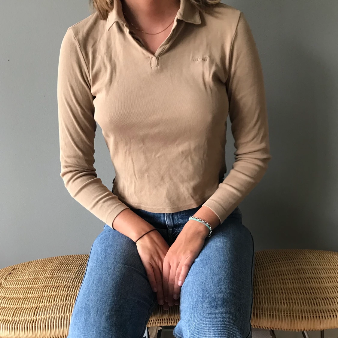 Beige långarmad piké