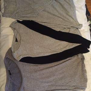 Tre gråa långärmade tröjor med olika matrial i bra skick liten fläck på första tröjan. Paket pris på alla 