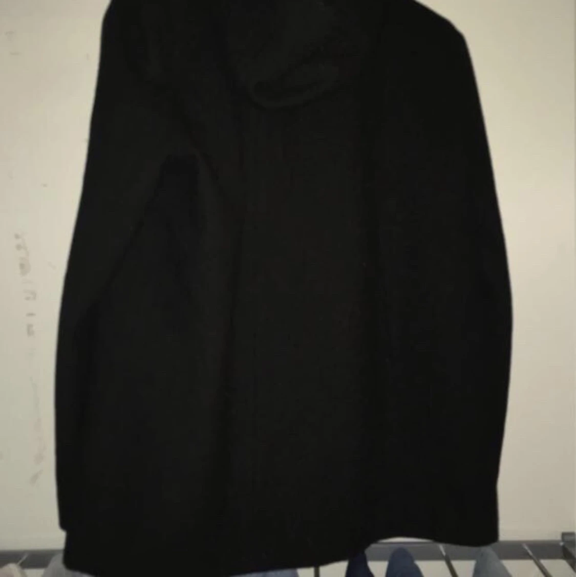 En svart kappa - 90