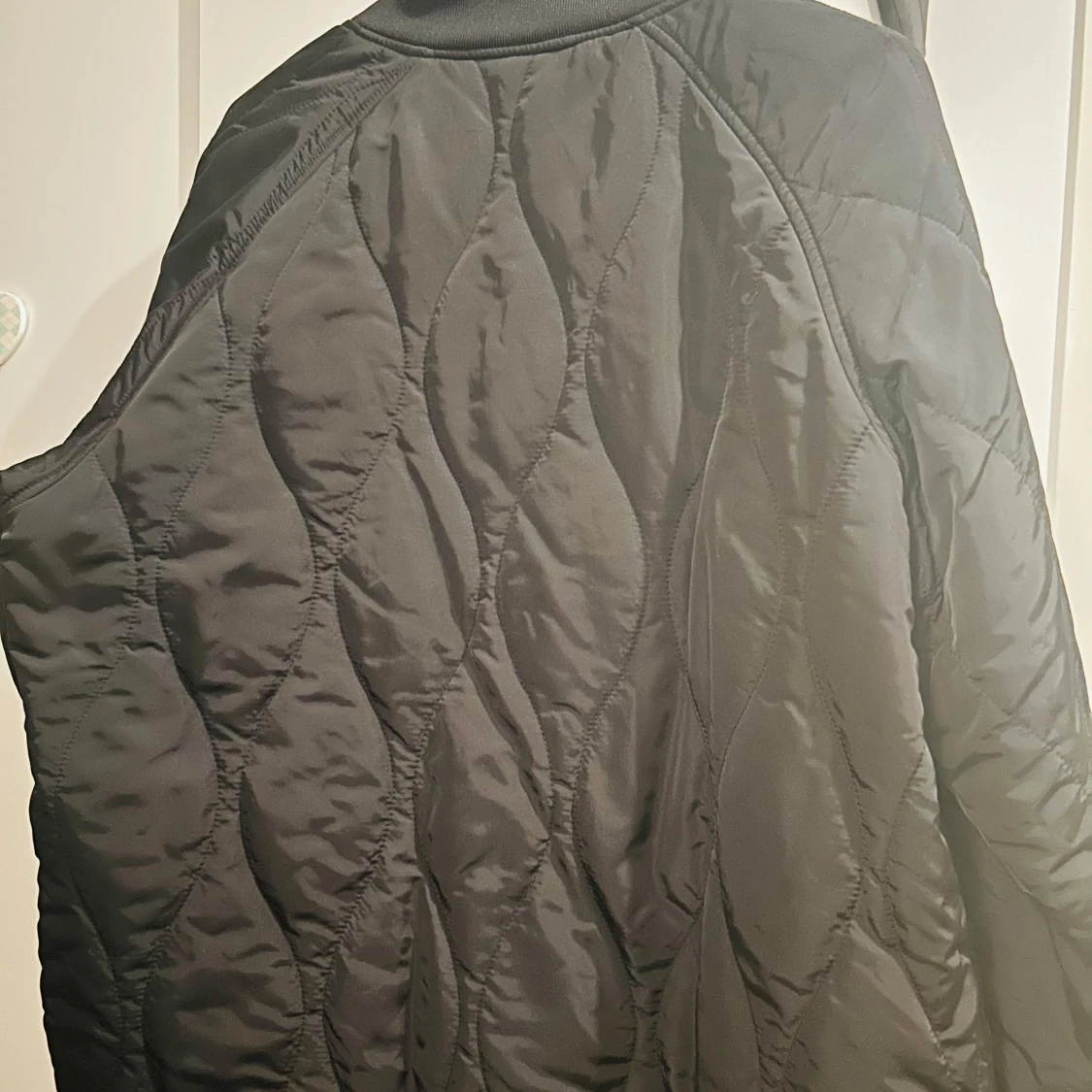 Svart quiltad jacka från xInt - 90