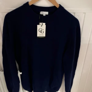 Helt ny 100% marin ull tröja - Skick 10/10 100% marinull Helt ny marinull hoddie i marin blå färg