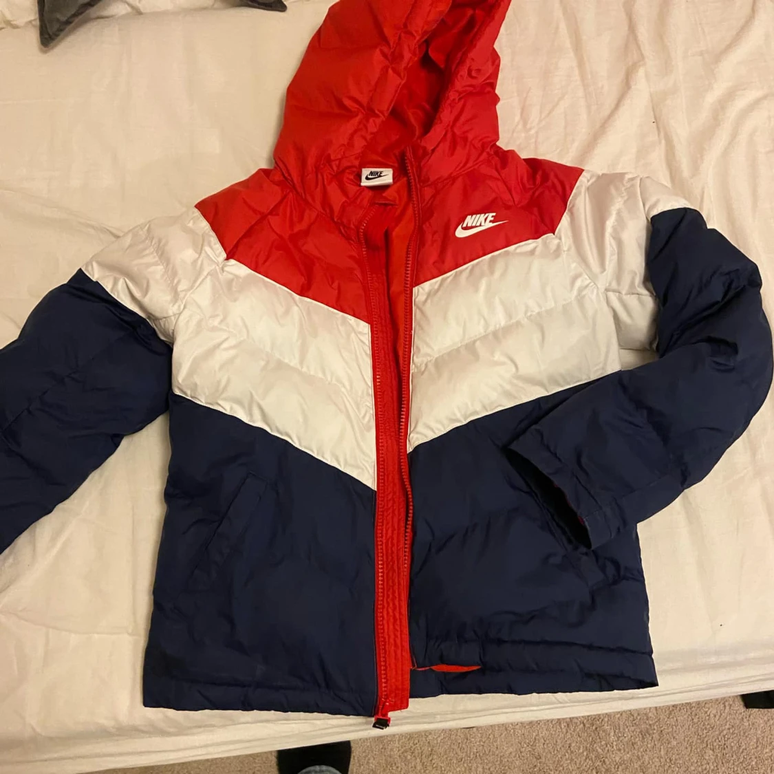 Flerfärgad pufferjacka från Nike