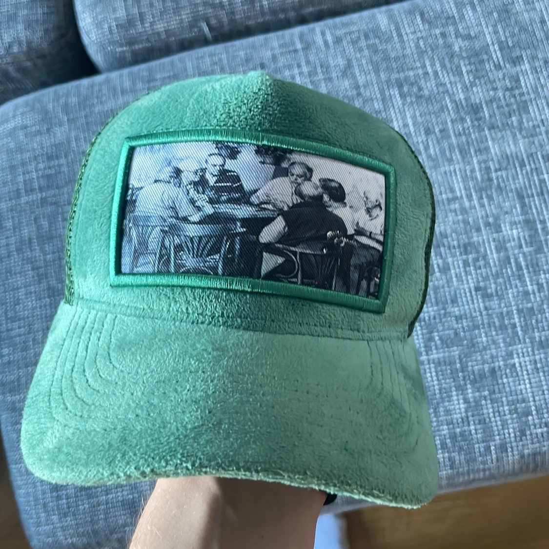 Grön keps med vintage-tryck