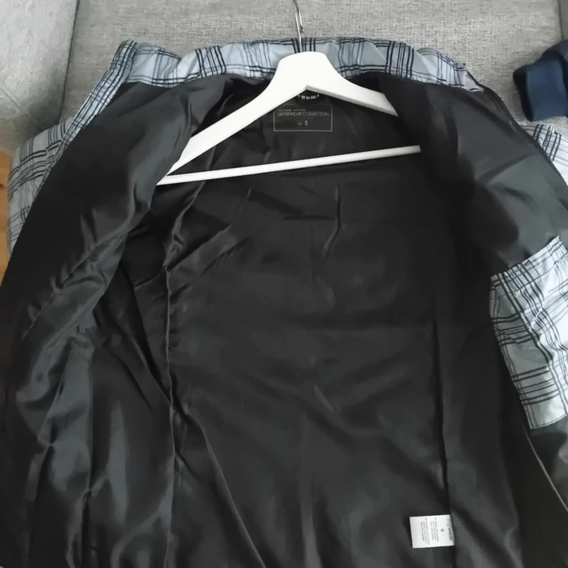 Grå rutig pufferjacka - 90