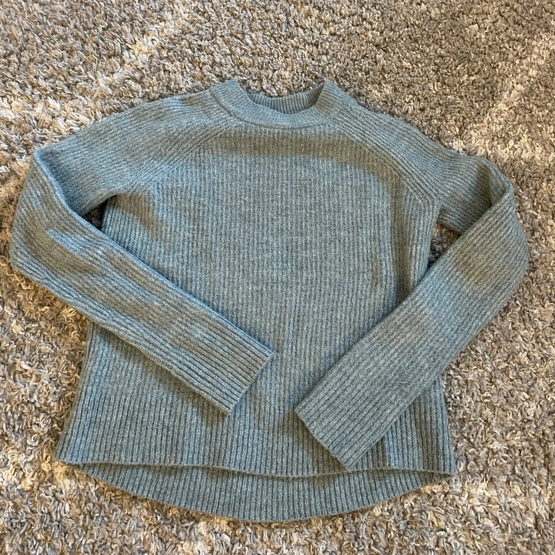 Blå stickad tröja från H&M