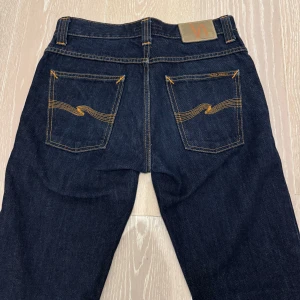 Nudie Grim Tim - Säljer ett par feta Grim Tim jeans! | Storlek: W30 L34 | Skick: Nyskick | Nypris: ca 1700kr | Hör av dig vid frågor eller funderingar! Priset är ej hugget i sten! 