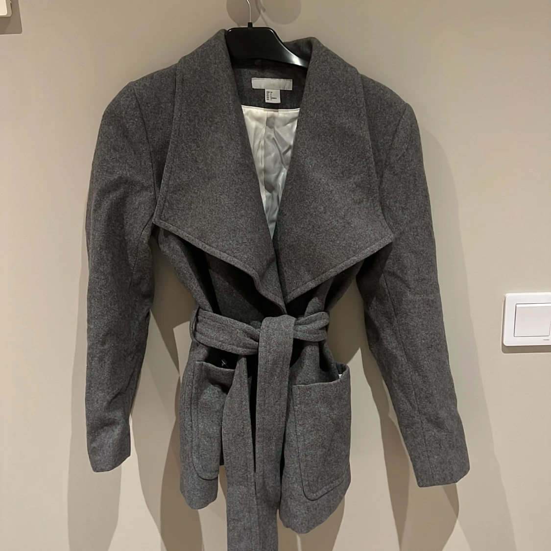 Grå kappa från H&M