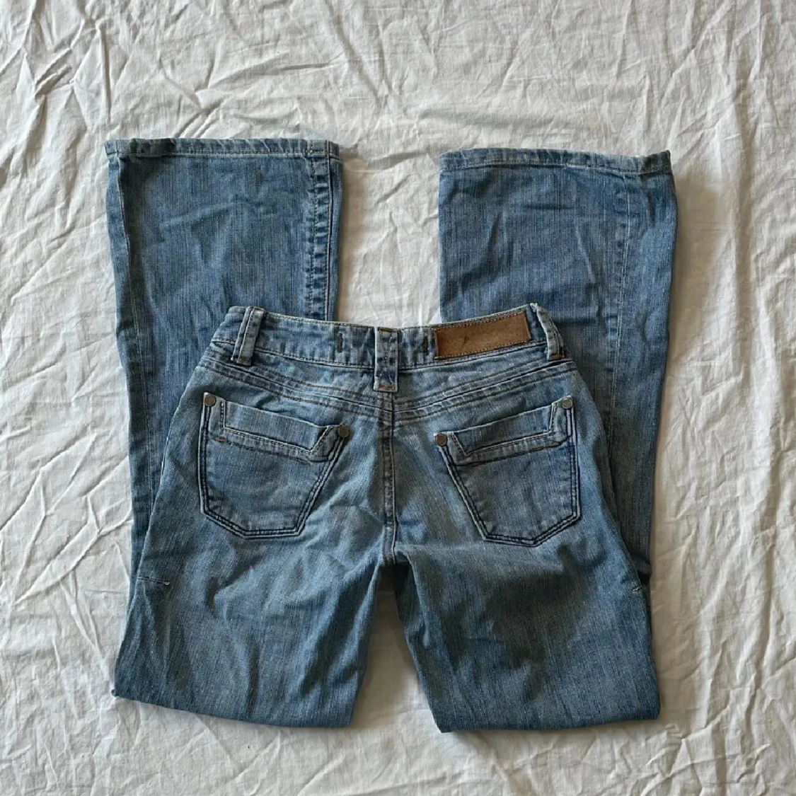 Blå bootcut jeans - 90