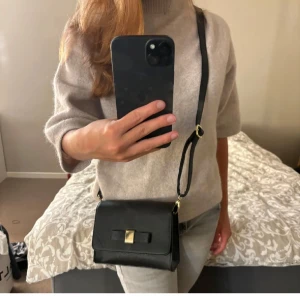 Väska - Svart väska i bra skick 