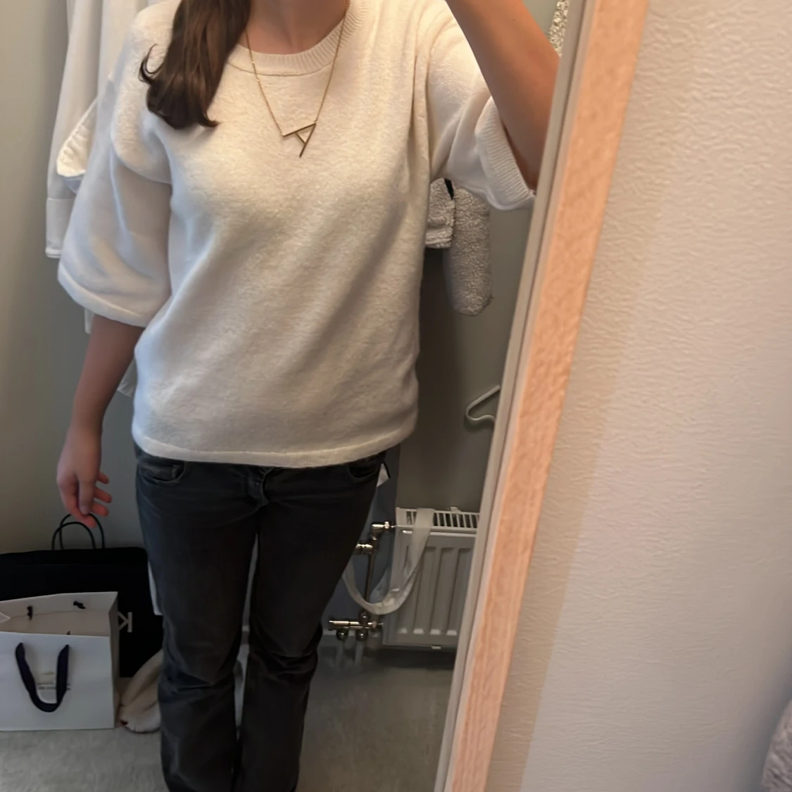 Stickad kortärmad tröja