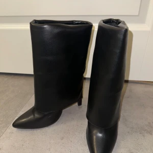 Boots med klack  - Nya boots aldrig använda 