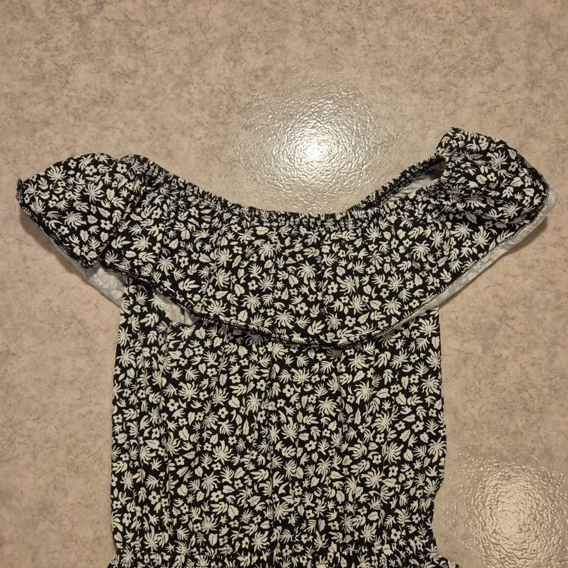 Blommig byxdress - 91