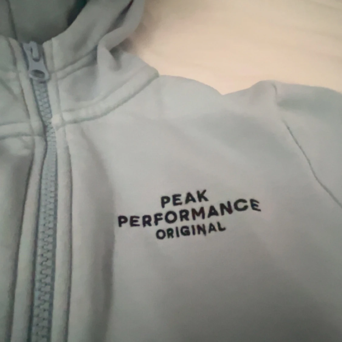 Ljusblå hoodie från Peak Performance - 90