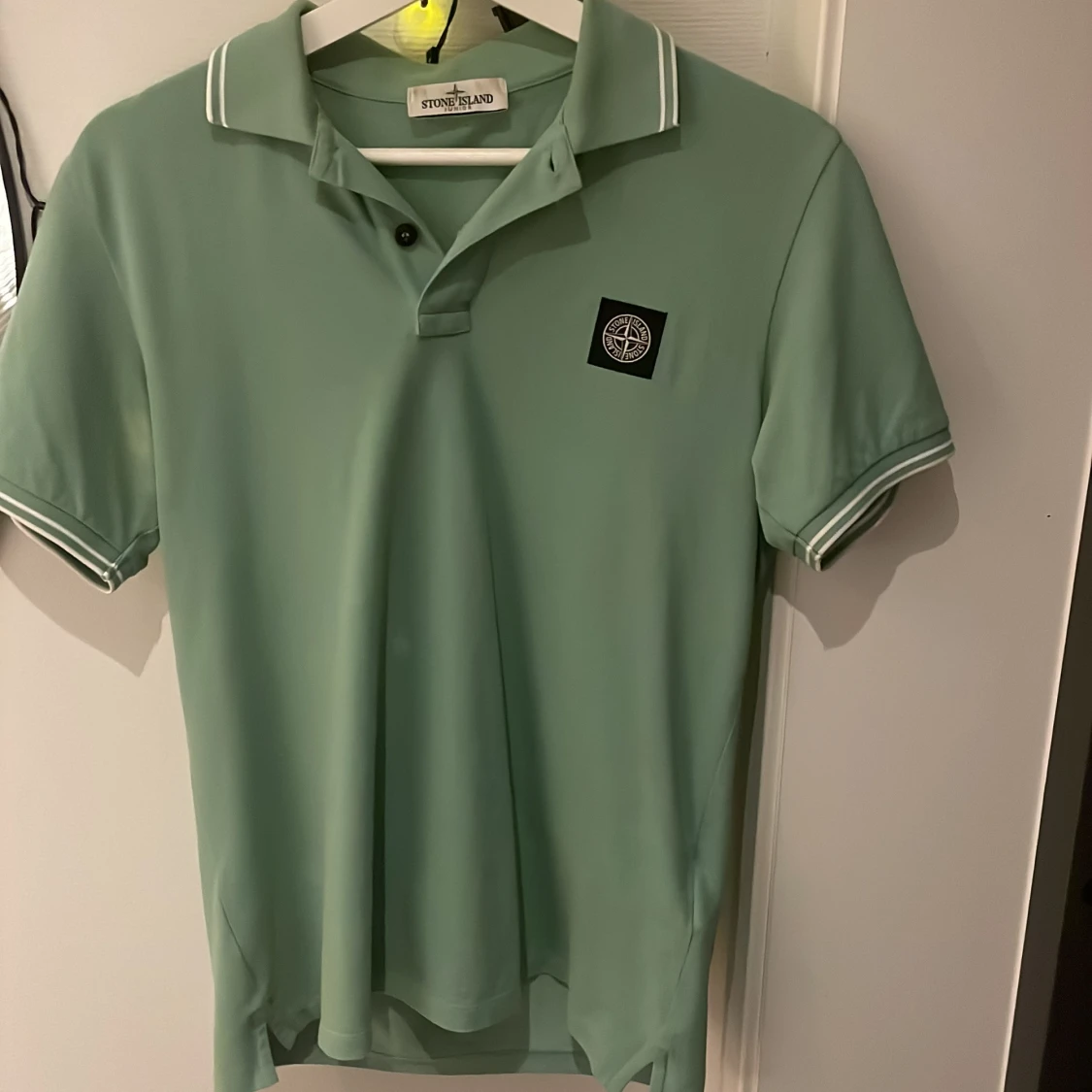 Grön pikétröja från Stone Island