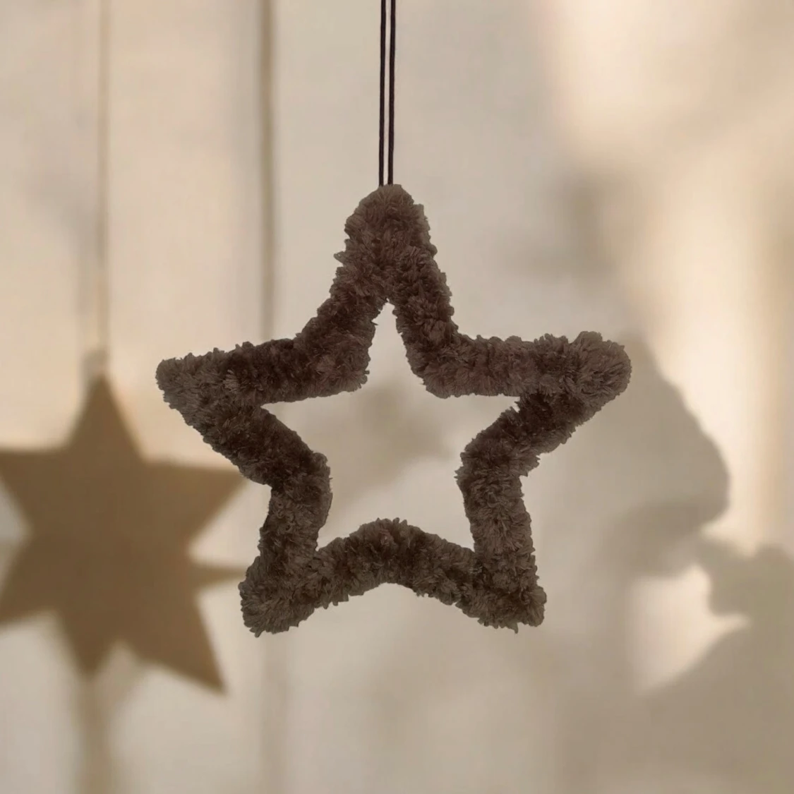 Dekorativ stjärna i fluffigt material