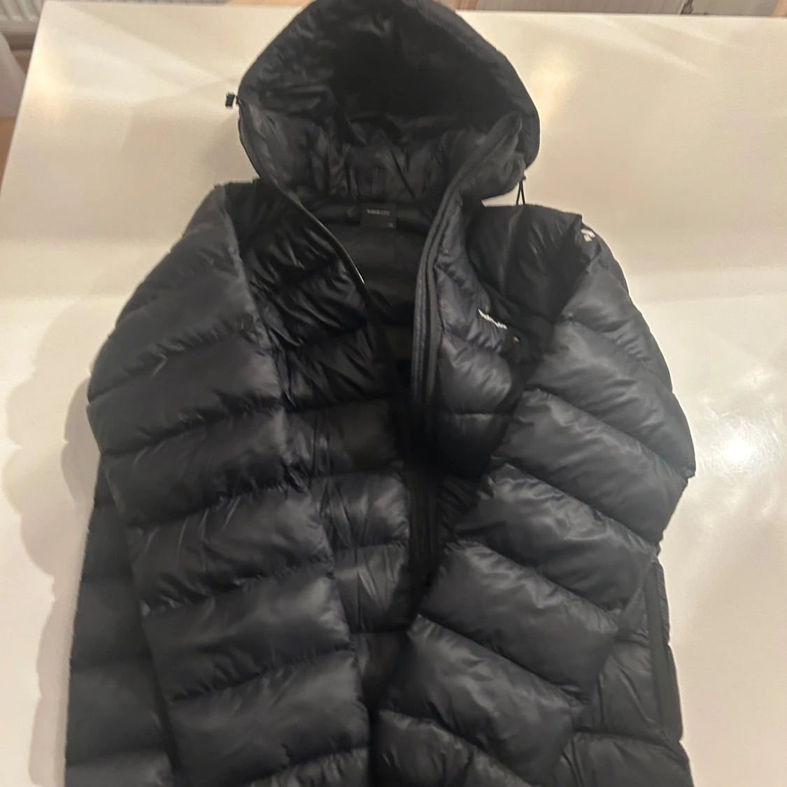 Svart dunjacka från Peak Performance - 92