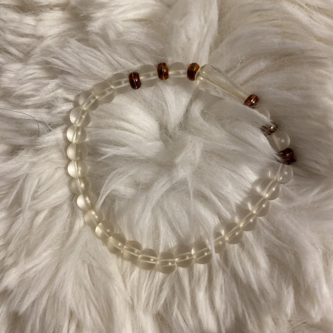 Vit utomlands armband från Italien  - 90