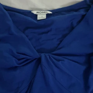 Blå monki tröja - Blå långärmad monki tröja