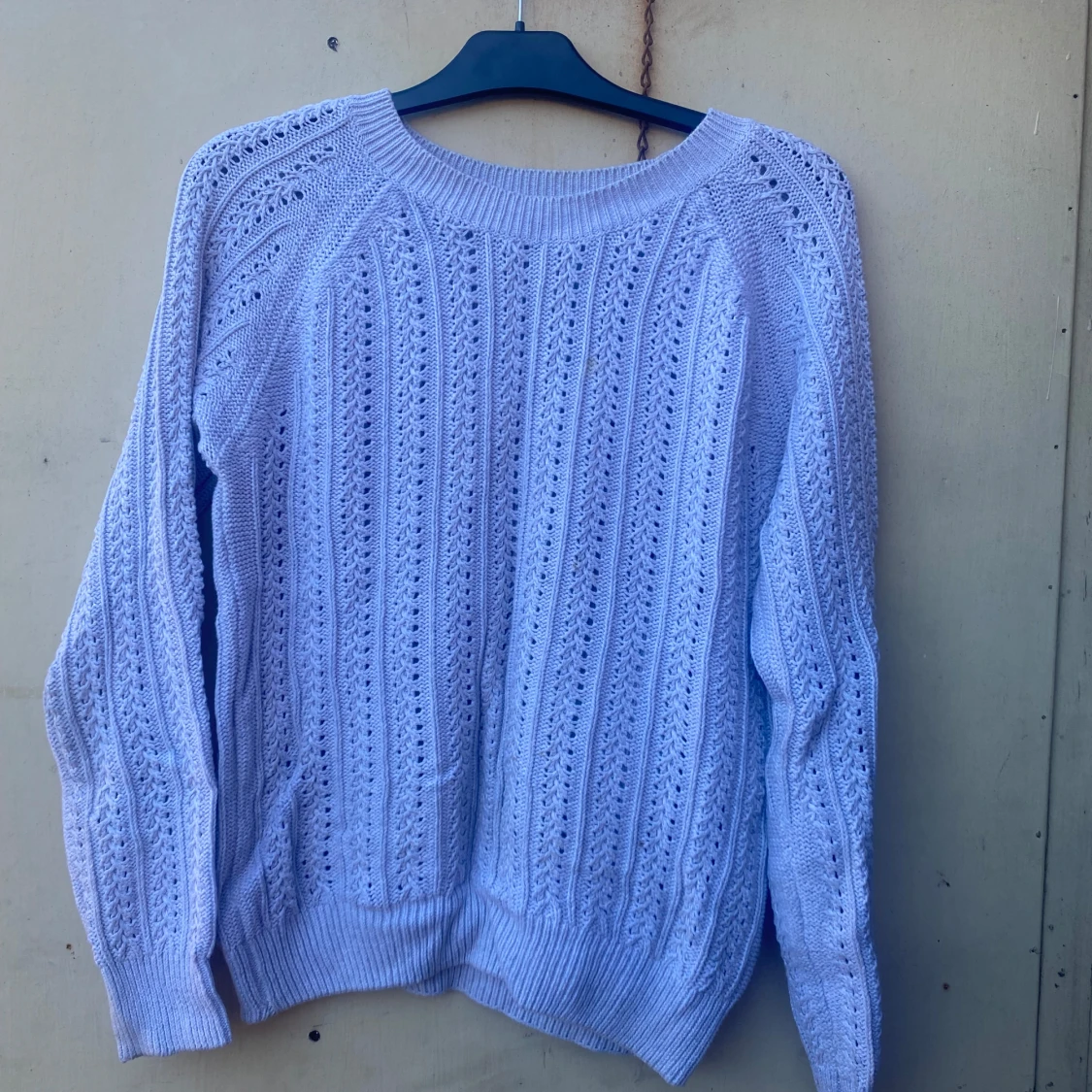 Ljuslila stickad tröja från Iconic Sport