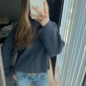 Grå stickad tröja  - Mycket bra skick, aldrig använt den