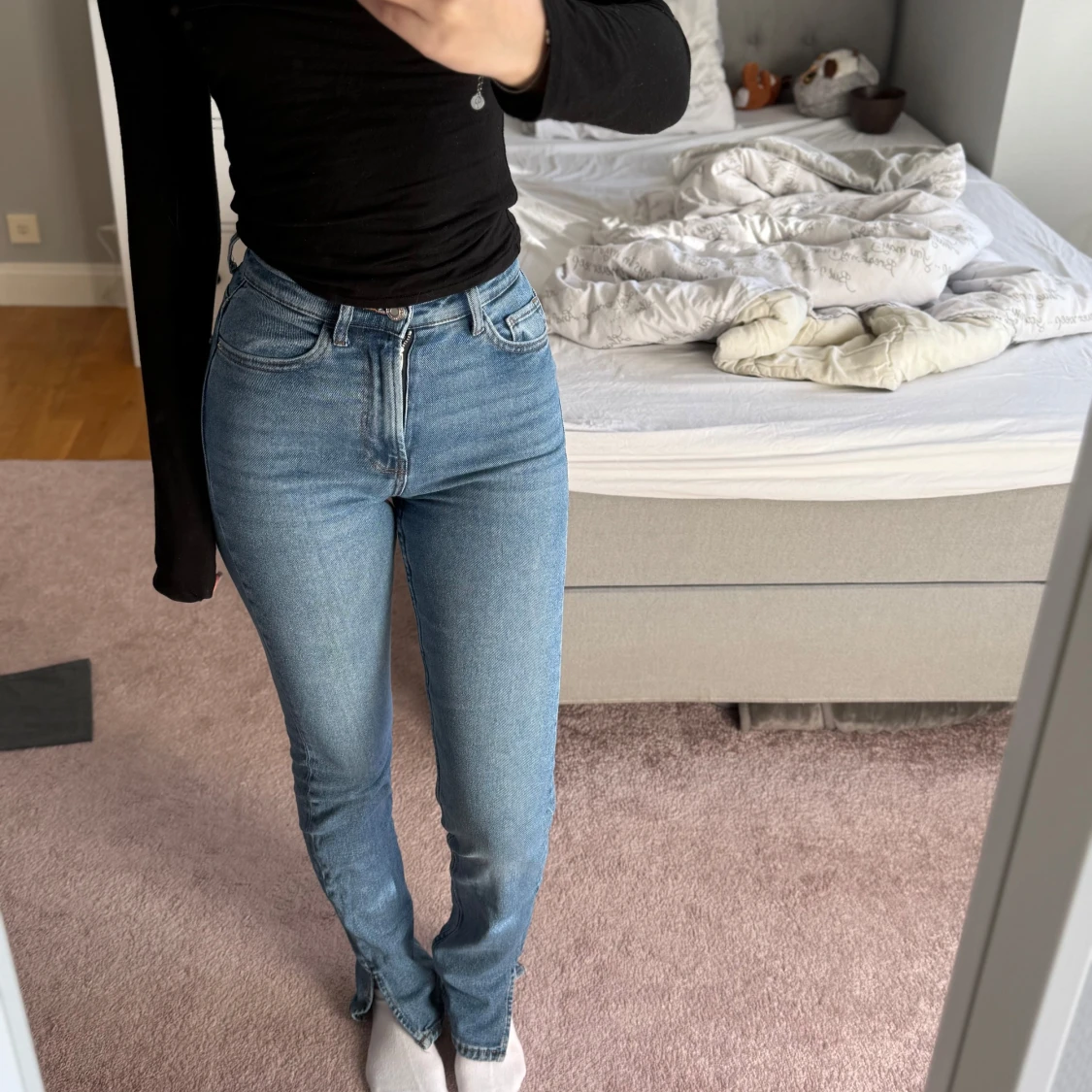 Blå jeans med bootcut