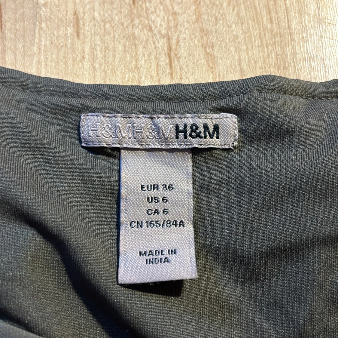Grön klänning från H&M.  - 91