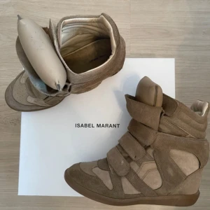 Isabel Marant sneakers  - Super snygga isabel marant sneakers! storlek 38 och modellen  beknett. Kan bytta mot vita eller svarta!