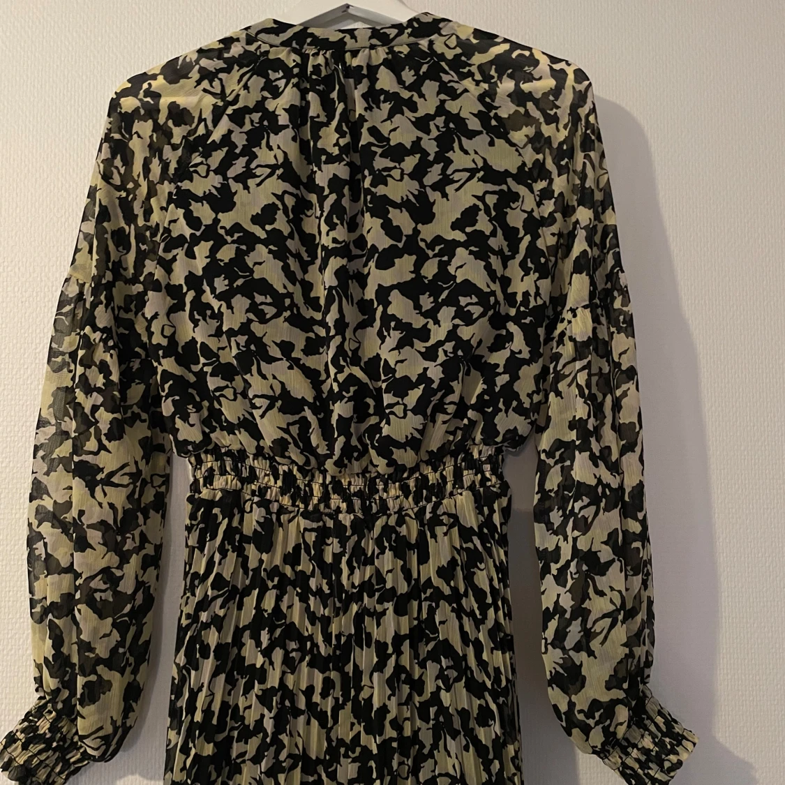 Mönstrad klänning från Stockh LM - 92