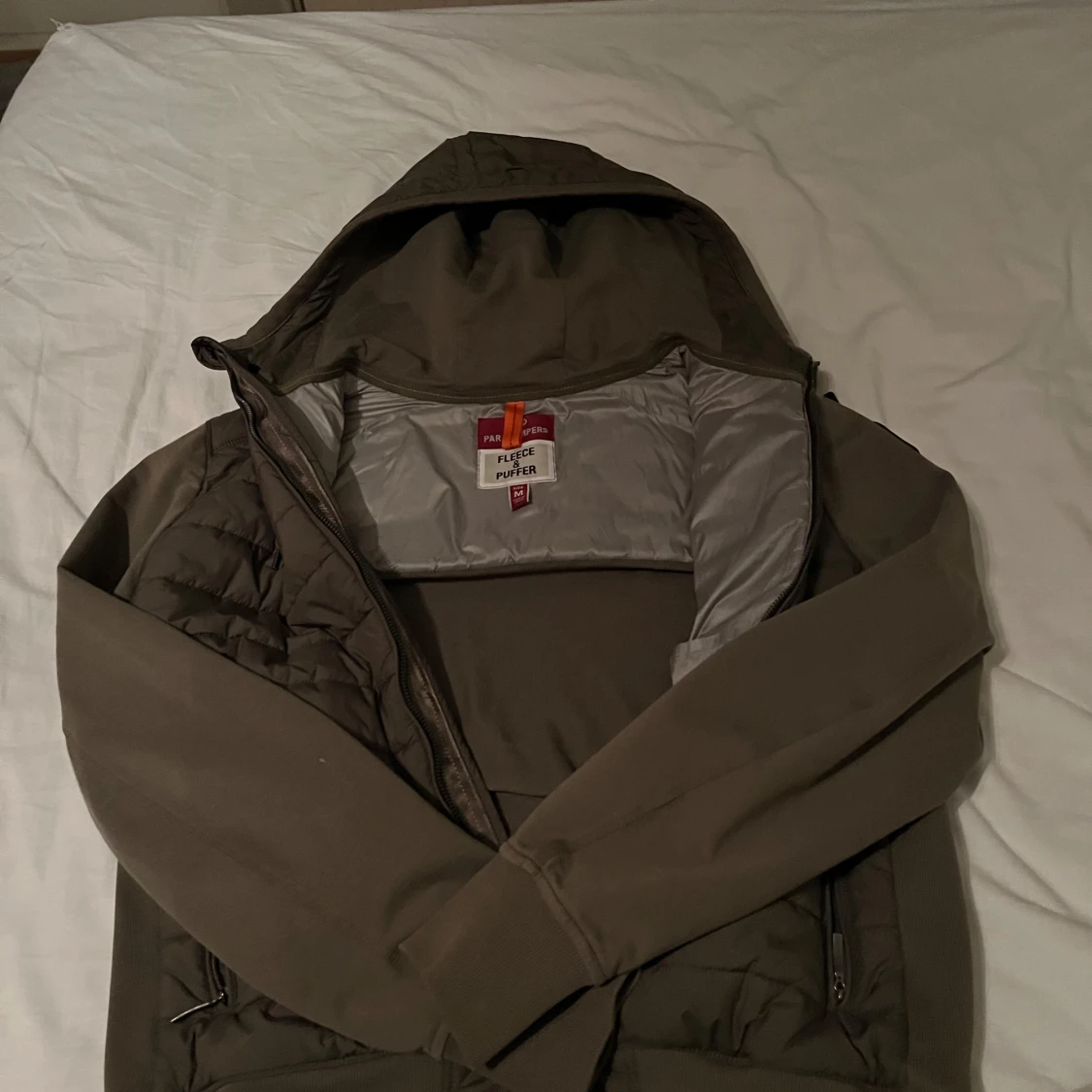 Grön jacka med huva från PJS - 90