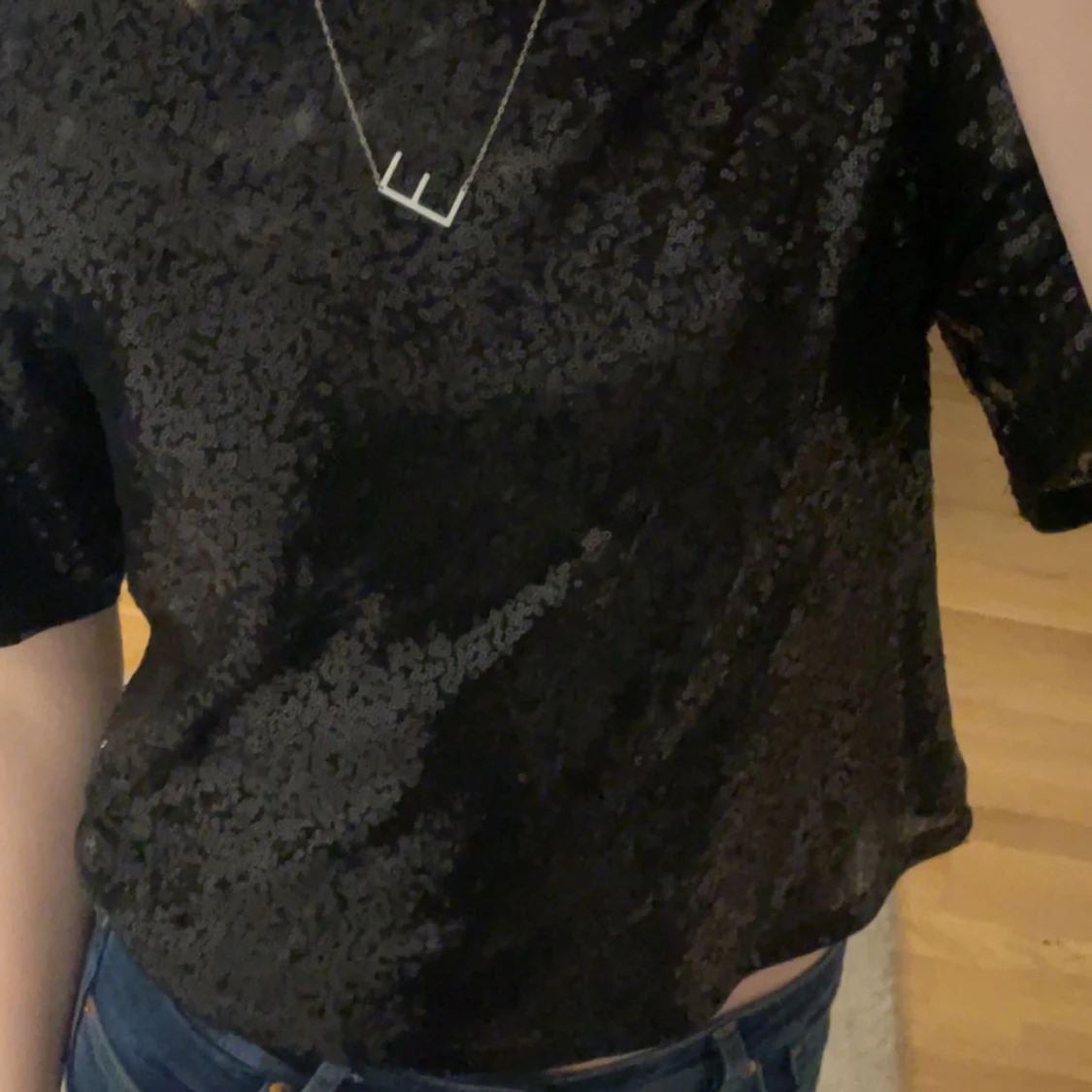Svart glittrig topp - 92