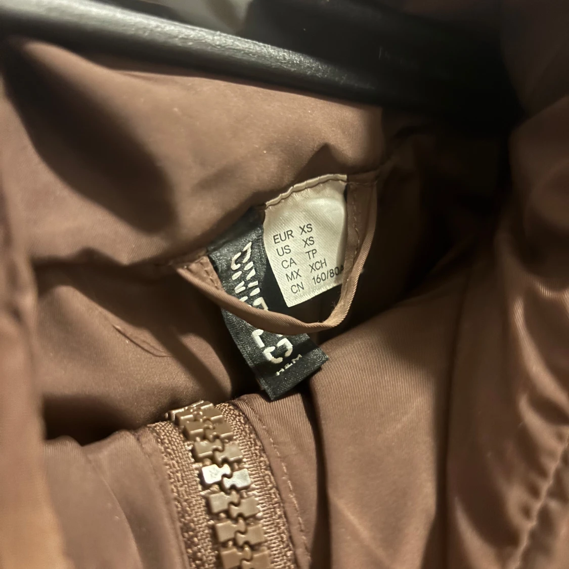 Brun pufferjacka från hm - 91
