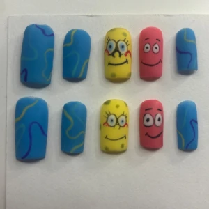 Svampbob press on nails -  Handgjorda Svampbob press on nails,strl S. Lim,instruktion,och fil medföljer!
