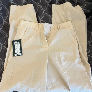 Kostym byxor - Beigea kostym byxor, helt nya och oanvända