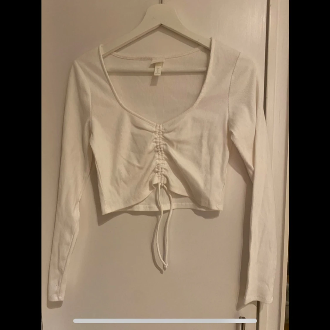 Helt ny! Vit croppad topp från H&M,