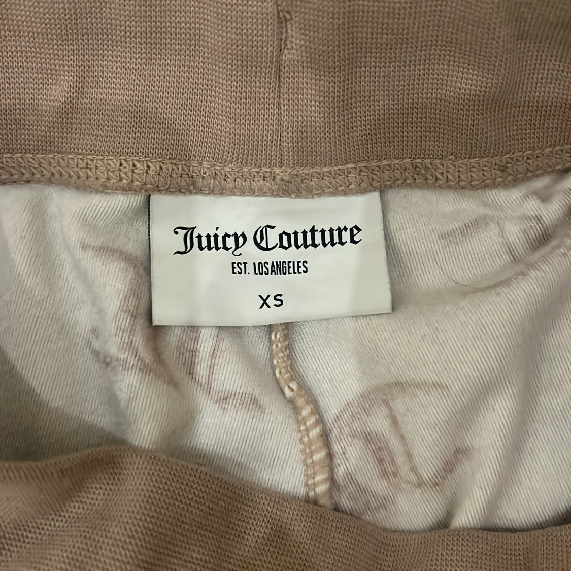 Beige mjukisbyxor från Juicy Couture - 92