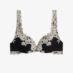 bh intimisimi  - två bh:ar från intimisimi. En med svart bas och vita blommor samt en med marinblå bas och vita blommor! 