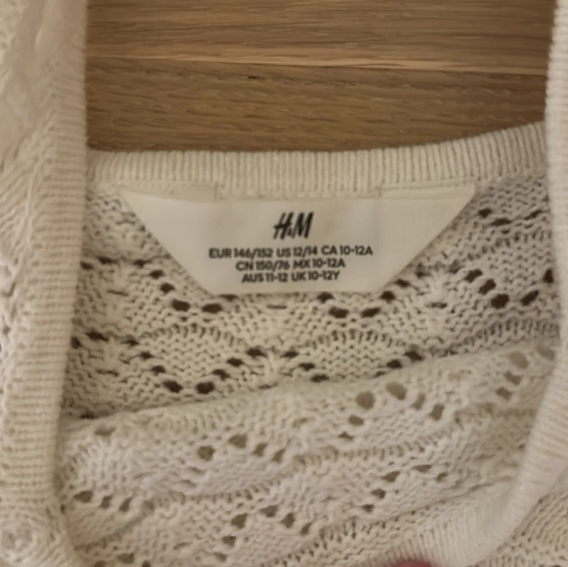 Vit stickad linnetopp från H&M - 2